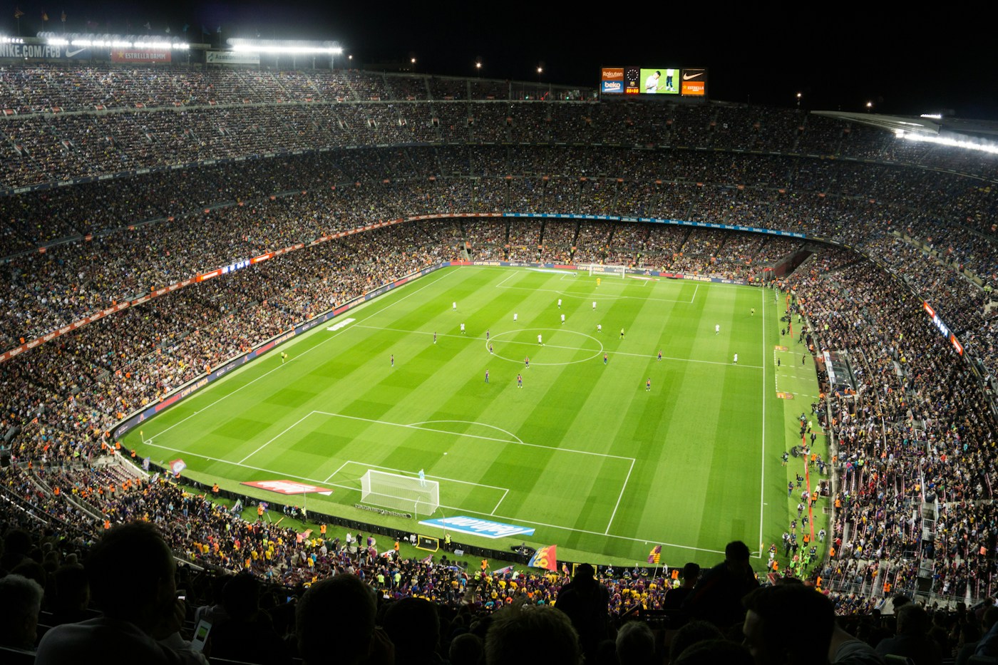 A full football stadium under the lights